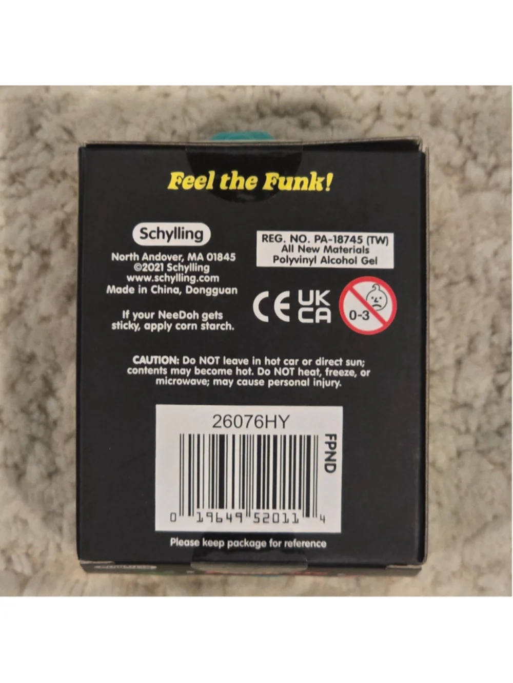 Schylling NeeDoh Funky Pup Sensory Toy One Size Teal Black